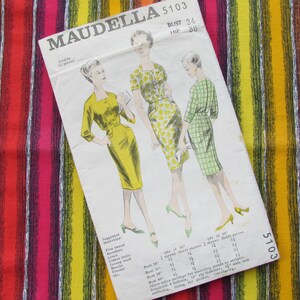 May include: Vintage sewing pattern for a dress, featuring three women in different styles. The pattern is labeled "Maudella 5103" and includes the measurements "Bust 34" and "Hip 38".