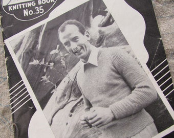 May include: Black and white photo of a man wearing a knitted sweater. The photo is from a vintage knitting book titled "Knitting Book No. 35".