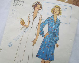 May include: Vintage sewing pattern featuring two dress designs. One dress is white with a button-down front, the other is blue with a floral pattern and a tie waist. The pattern includes bust measurements of 36" and 38".