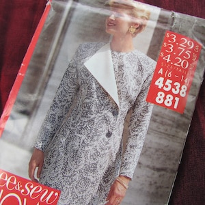 May include: A black and white patterned blazer with a white collar and a button fastening. The blazer is shown on a model with the text "See & Sew" and a pattern number "4538 881" on the front.