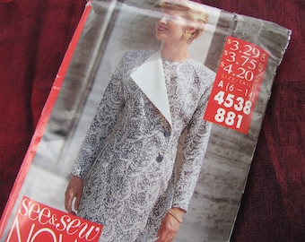 May include: A black and white patterned blazer with a white collar and a button closure. The blazer is shown on a model with the text "See & Sew" and a pattern number "4538 881" on the front.