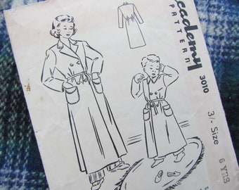 May include: A vintage sewing pattern for a robe, featuring a woman and a child in long robes with pockets and belts. The pattern is for sizes 3-6 years and is from Academy Pattern 3010.
