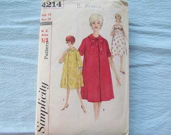 May include: Vintage Simplicity sewing pattern number 4214 for a dress with a bow at the neck. The pattern is for size 14, bust 34. The pattern includes instructions for making a dress with short sleeves and a button-up front.