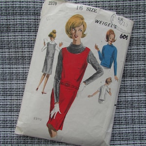 May include: Vintage sewing pattern for a dress with a turtleneck and a red sleeveless top. The pattern is size 16 and is from the Weigel's brand. The pattern number is 2370.