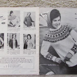 May include: A vintage knitting pattern booklet with a black and white photo of a woman wearing a white sweater with a black and white geometric pattern. The booklet is titled "Fon-tana" and the pattern number is 409. The price is 1/3.