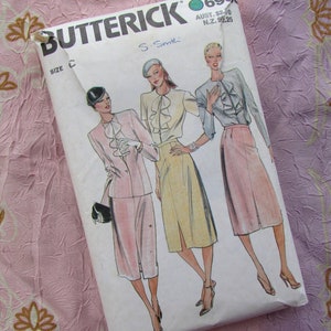 May include: Vintage sewing pattern for a women's skirt and blouse. The pattern is from Butterick and features three different styles. The pattern is on a white background with a pink and white floral pattern.
