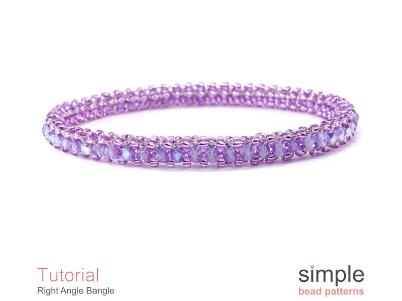 May include: A purple beaded bangle bracelet made with right angle weave. The bracelet is on a white background.