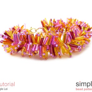 May include: A close-up of a colourful beaded bracelet made with orange, yellow and pink bugle beads. The bracelet is arranged in a circular shape and is on a white background. The text "Tutorial Bugle Lei" is below the bracelet.