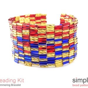 May include: A wide, shimmering bracelet made of red, blue, and gold beads. The bracelet has a woven pattern and is displayed on a white background. The text "Beading Kit Shimmering Bracelet" is visible.
