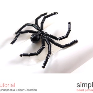 May include: Black beaded spider with a black bead for a body. The spider is on a white surface.  Tutorial Arachnophobia Spider Collection simple bead patterns