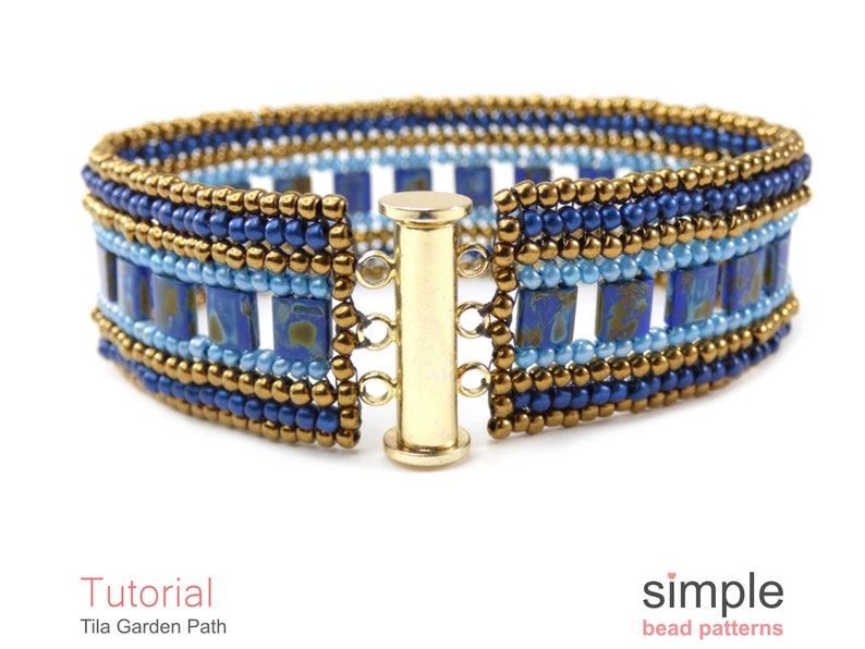 May include: A blue and gold beaded bracelet with a toggle clasp. The bracelet features a geometric pattern with square beads.