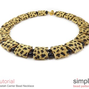 May include: Gold and black beaded necklace with a cheetah print pattern. The necklace is made of small beads and has a clasp closure. The necklace is about 18 inches long.