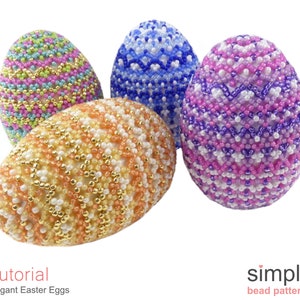 May include: Four beaded Easter eggs in different colours and patterns. The eggs are made with small beads in shades of pink, purple, blue, green, yellow, and white. The eggs are arranged on a white background.