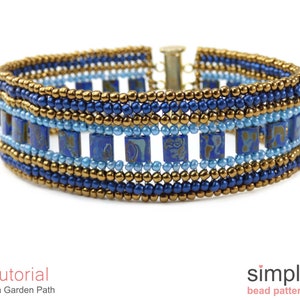 May include: A beaded bracelet with a gold, blue and light blue colour scheme. The bracelet features a repeating pattern of square beads and round beads. The bracelet is made with a clasp closure.