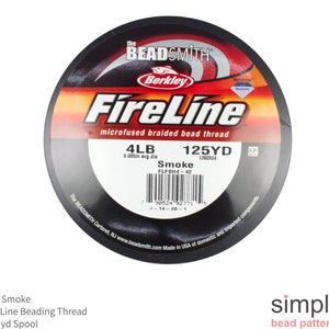 May include: A spool of black FireLine microfused braided bead thread. The spool is labeled with the text "FireLine", "microfused braided bead thread", "4LB", "125YD", "Smoke", and "0.005 in avg. dia".