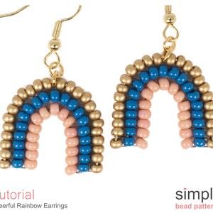 May include: A pair of rainbow beaded earrings with gold accents. The earrings are made with small, round beads in shades of pink, blue, and gold. The beads are arranged in a rainbow pattern, with the gold beads forming the outer edge of the rainbow.