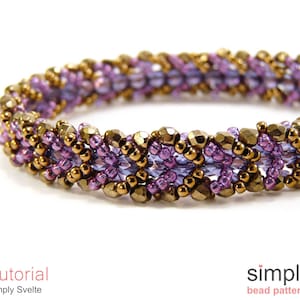 May include: A close-up of a purple and gold beaded bracelet. The bracelet is made with small, round beads and has a woven pattern.