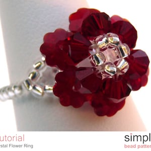 May include: A red crystal flower ring with silver beads. The ring is on a white background. Tutorial: Crystal Flower Ring. simple bead patterns.