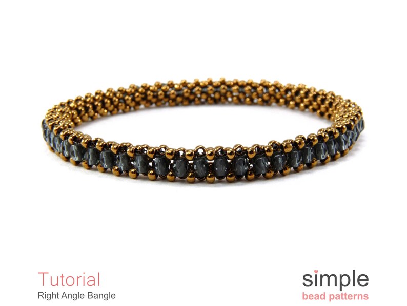 May include: A gold and grey beaded bangle bracelet. The bracelet is made with small, round beads in a right angle weave pattern. The bracelet is a simple design and would be a great addition to any jewellery collection.
