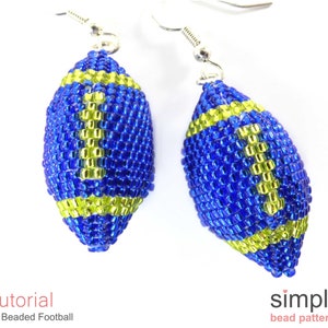 May include: A pair of blue and yellow beaded football earrings. The earrings are made with small beads and have a 3D design. The earrings are hanging from silver hooks.