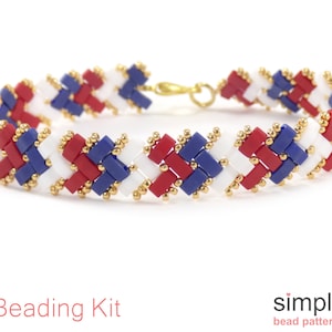 May include: A woven bracelet featuring red, white, and blue beads, accented with gold-colored beads. The bracelet has a gold-colored clasp. The words "Beading Kit" are in red text at the bottom of the image.