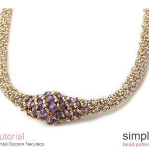 May include: A gold and purple beaded necklace with a crystal cocoon design. The necklace is made with small seed beads and features a unique twisted knot.