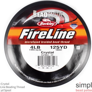 May include: A spool of FireLine microfused braided bead thread, labeled 4LB, 125 YD, and Crystal. The packaging features the brand names Berkley and The Beadsmith, with the text "microfused braided bead thread". The spool is black with red and orange accents.