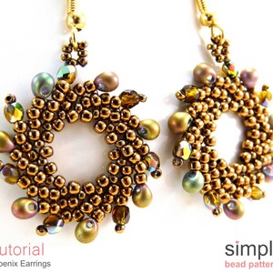 May include: A pair of gold and brown beaded earrings with a circular design. The earrings are made with small beads and have a delicate, intricate look.