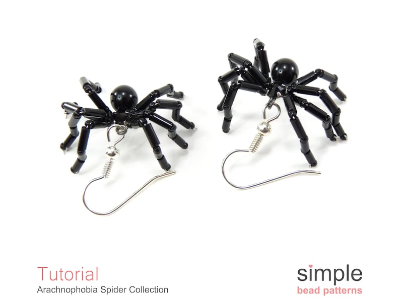 May include: A pair of black beaded spider earrings with silver hooks. The spiders are made with black beads and have a black bead for the body. The earrings are a fun and spooky accessory for Halloween.