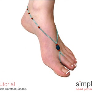 May include: A light blue beaded foot jewelry with red and dark blue beads. The jewelry is worn on a person's foot.