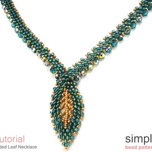 May include: A green and gold beaded necklace with a leaf pendant. The necklace is made with small, faceted beads and has a simple, elegant design. The pendant is a single leaf shape, with gold beads outlining the edges.  Tutorial: Gilded Leaf Necklace
