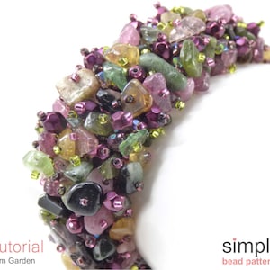 May include: A close-up of a multi-colored gemstone bracelet with a variety of shapes and sizes. The bracelet is made with pink, green, brown, and black gemstones. The bracelet is on a white surface. The text "Tutorial Gem Garden" is in the lower left corner of the image. The text "simple bead patterns" is in the lower right corner of the image.