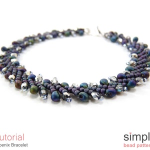 May include: A close-up of a beaded bracelet with a dark purple and iridescent finish. The bracelet is made with small round beads and crystal beads. The bracelet is on a white background.