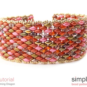 May include: A close-up of a beaded bracelet with a gold, pink, orange, and brown color scheme. The bracelet is made with small, seed beads and has a woven pattern. The bracelet is called "Flaming Dragon" and is a tutorial from "simple bead patterns".