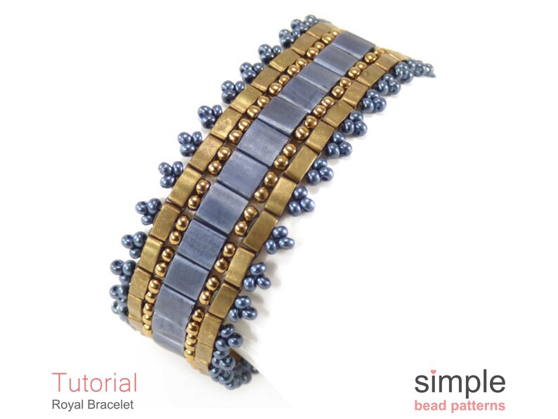 May include: A close-up of a blue and gold beaded bracelet. The bracelet is made with small, round beads and larger, rectangular beads. The bracelet is a simple design, with a repeating pattern of beads.