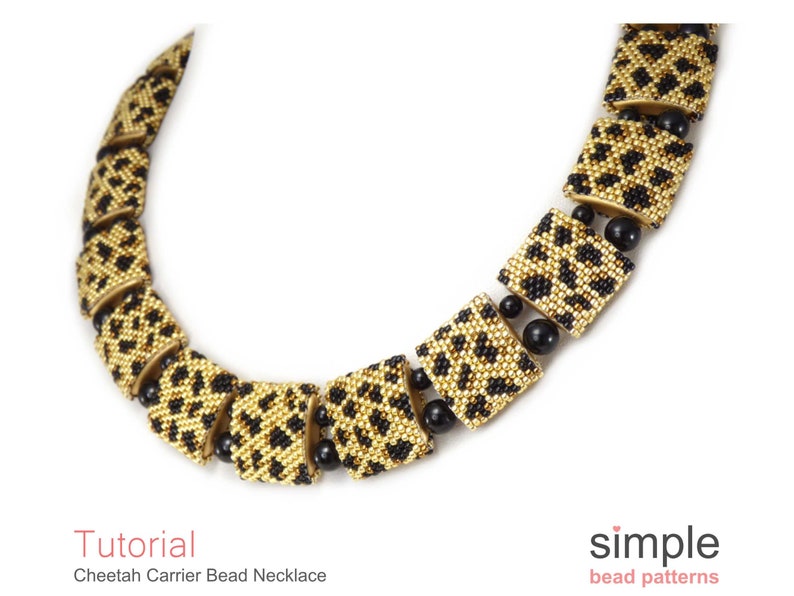 May include: Gold and black beaded necklace with a cheetah print pattern. The necklace is made of small square beads and has a simple design.