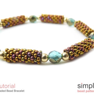 May include: A beaded bracelet with gold, brown, and teal beads. The bracelet is made with small seed beads and larger round beads. The bracelet is a simple design and would be a great addition to any jewelry collection.