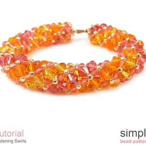 May include: A close-up of a beaded bracelet with a gradient of orange, yellow, and red beads. The bracelet is made with small, faceted beads and has a simple, elegant design.