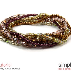 May include: A multi-strand stretch bracelet made with small, iridescent beads in shades of gold, brown, and purple. The bracelet is made with a stretchy cord, allowing it to fit a variety of wrist sizes.