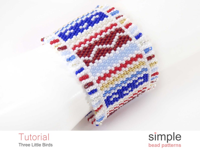 May include: A beaded bracelet featuring a geometric pattern in red, white and blue. The bracelet is made with small seed beads and has a simple design.