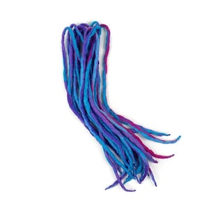 May include: A bundle of blue, purple, and pink wool dreadlocks. The dreadlocks are approximately 20 inches long and are made of 100% wool.