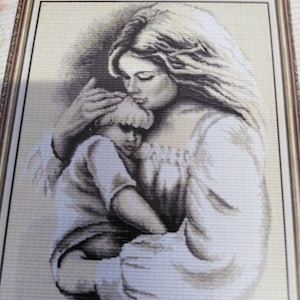 This MOTHER AND BABY is a 22 ct Needle point New and unopened Kit with Sorted 100% Cotton Threads