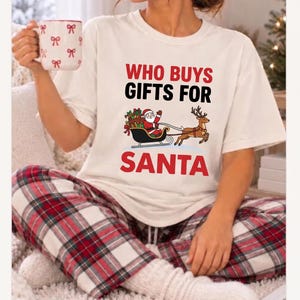 Who Buys Gifts For Santa Shirt, Funny Retro Christmas Tee, Vintage Xmas Sleigh Graphic Top, Secret Santa Gift, Holiday Apparel