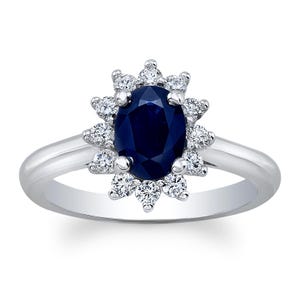 Women’s Platinum 1 carat Oval blue sapphire with 1/3 ctw diamond halo engagement ring