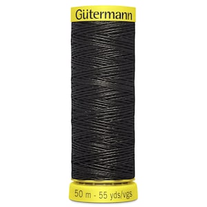 May include: A spool of black thread with a yellow top and bottom cap. The top cap features the brand name Gütermann in black text. The bottom cap displays the length as 50 m - 55 yds/vgs. The thread is wound in a cross-hatch pattern around the spool.