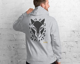 May include: A light gray hooded sweatshirt featuring a large black graphic of a stylized panther head on the back, surrounded by small black leopard-like spots. The text No Comment is printed in small yellow letters below the panther graphic.