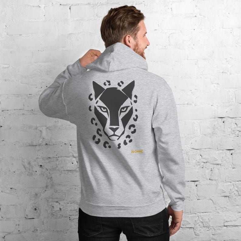Sudadera con capucha con estampado abstracto de leopardo en la parte delantera, estampado minimalista de felino grande en la espalda, etiqueta dorada con grafiti en el pecho, sudadera unisex – Sin comentarios imagen 1