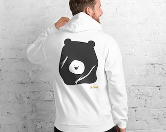 May include: A white hooded sweatshirt featuring a large black bear graphic on the back. The bear design includes a white circular face with a small nose and eyes. The text No Comment is printed in small yellow letters below the bear graphic.