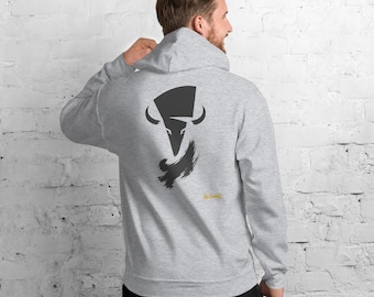 May include: A light gray hooded sweatshirt featuring a dark gray graphic of a stylized bull head on the back. Below the bull graphic, there is a small yellow text logo that reads No Comment. The hoodie has long sleeves and a hood.