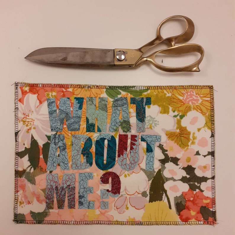 Applique embroidery textile art ready to frame. What about me